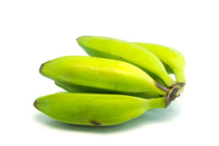 isolated green bananas against the white backgrounの写真素材