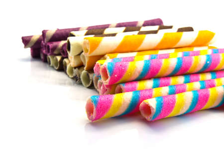 row colerful candies on white の写真素材