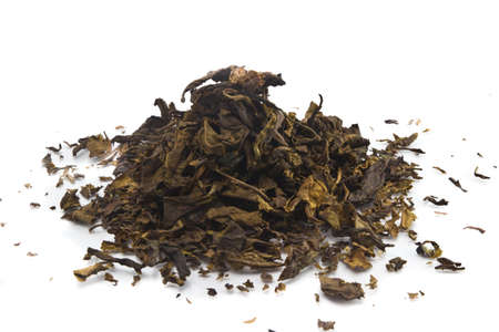 dry green tea isolated on a white backgroundの写真素材