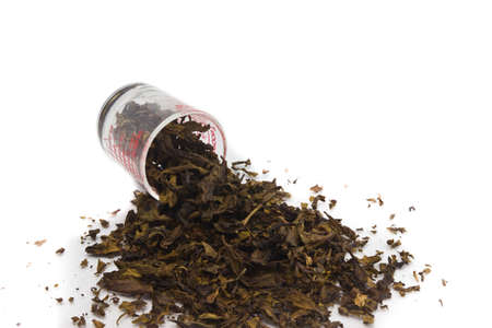 dry green tea isolated on a white backgroundの写真素材