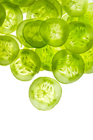 Fresh Cucumber and slices white background,の写真素材