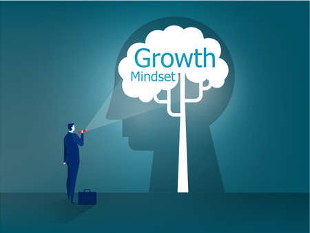 Businessman stands with a flashlight to growth mindset on head human concept vectorのイラスト素材
