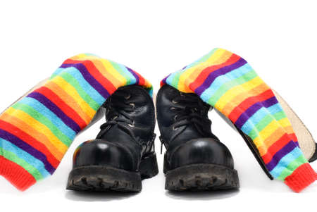 Heavy shoes and striped socks isolated on white backgroundの写真素材