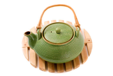 Green teapot on standの写真素材