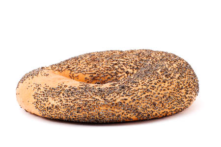 One bagel with poppy seeds on whiteの写真素材