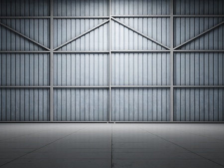 Large warehouse door illuminate spotlightの写真素材