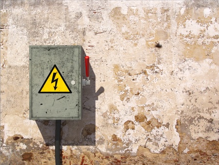 Knife switch on old dirty wall