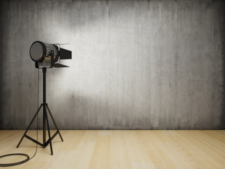 Studio light illuminates the interior with concrete wallの写真素材