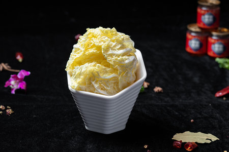 Cabbage Ice Cream in a White Cup on a Black Background.の写真素材