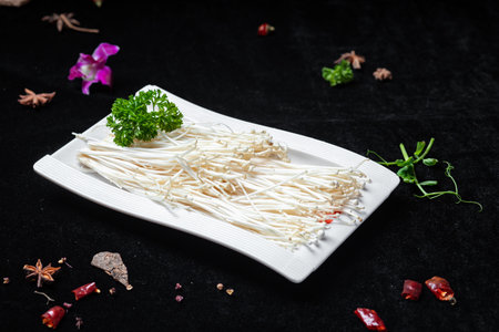 Japanese Cuisine, Enoki Mushrooms with Parsley on Black Background