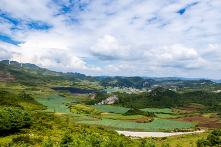 Beautiful landscape scenery view of the green field and mountain in Taiwanの写真素材