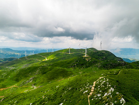 Wind turbines on the mountain in Carpathian mountains, Ukraine.の写真素材