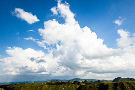 Landscape with blue sky and white clouds. Beautiful nature scene.の写真素材
