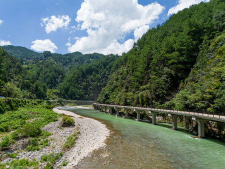 Bridge over the river in the mountains of the Republic of Abkhaziaの写真素材