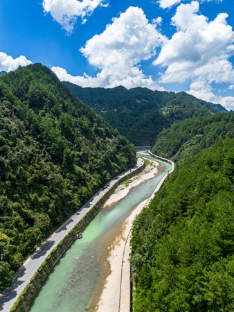 Aerial view of the winding river in the mountains in summer.の写真素材