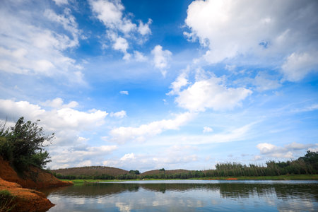 landscape with blue sky and white clouds over the lake, Thailand.の写真素材