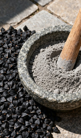 Mortar and pestle with black cumin seeds, closeupの素材