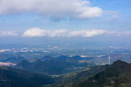Aerial view of the mountain and blue sky with white clouds.の写真素材