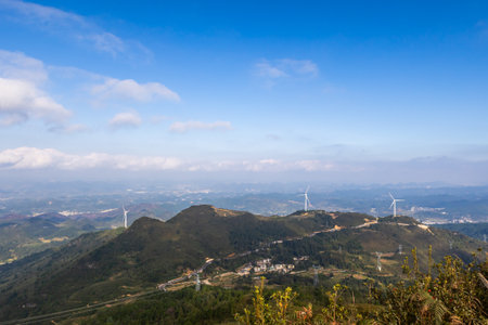 wind turbine on the mountain at hong kong,chinaの写真素材