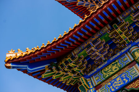 Beautiful Chinese temple roof with blue sky in Beijing, China.