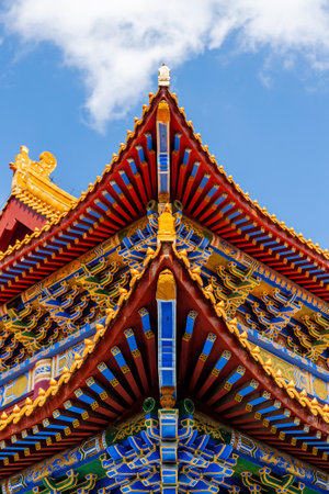 The roof of the chinese temple against the blue sky, Thailand.の写真素材