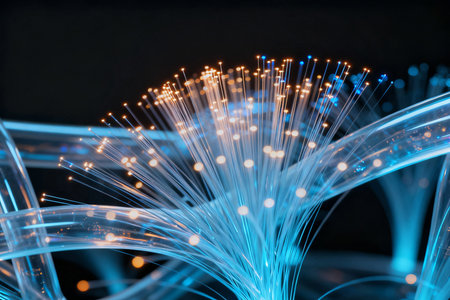 Fiber optical network cable close up. Blue fiber optic background.の素材