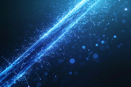 blue glowing particles form curved lines and bokeh, abstract backgroundの素材