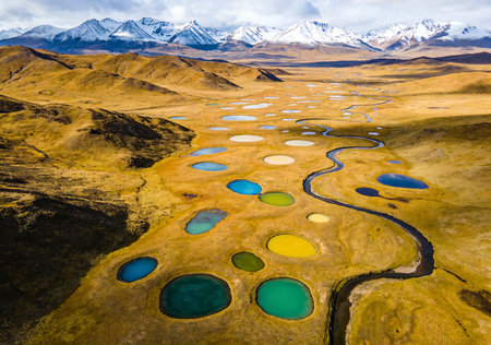 Aerial view of lake and mountains in Pamir in Tajikistanの素材