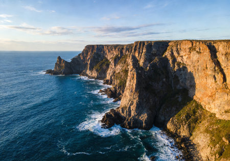 Aerial view of the cliffs of Cabo da Roca at sunset, Portugalの素材