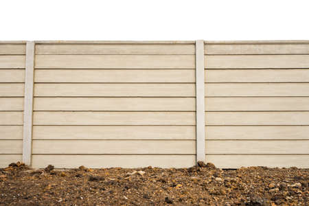 Front view of  precast concrete Wall on fresh ground floor, prefabricated cement compound wall isolated on white backgroundの写真素材