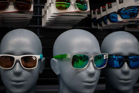 sunglasses bald mannequins model head at display