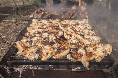 Barbecue with chicken, pork ribs and chopの写真素材