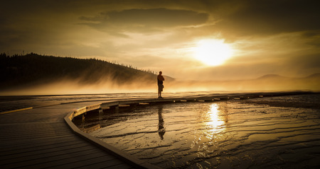 Sunset view of Grand Prismatic Spring in Yellowstone National Parkの写真素材