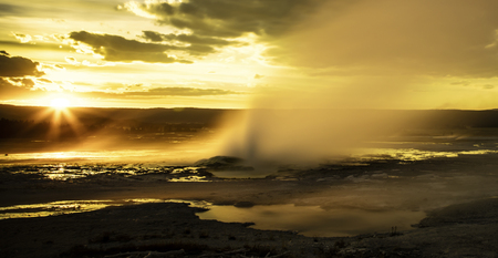 Yellowstone National Park - A little geyser during sunsetの写真素材