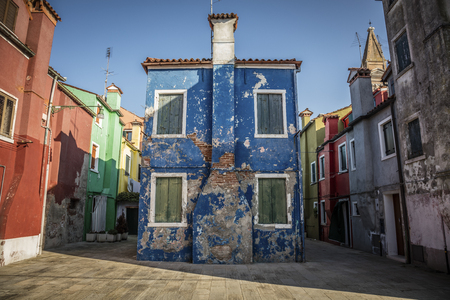 Typical colored houses in Burano, a little town in the Venetian lagoonの写真素材
