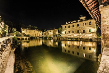 Ancient village Bagno Vignoni in Tuscany. Thermal little town in the center of Italy.の写真素材