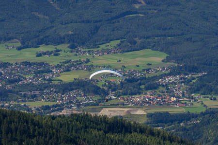 Paraglider above Austrian Alpsの写真素材
