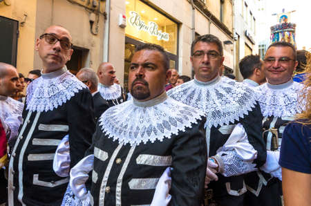 Traditional religious procession which takes place every August 14th in the city of Sassari (Sardinia), during which 10 wooden columns with the weight of 400Kg each are carried on shoulder through the city.のeditorial素材