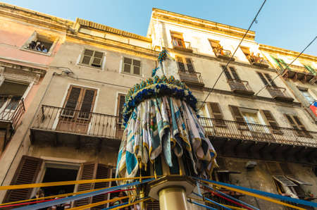 Traditional religious procession which takes place every August 14th in the city of Sassari (Sardinia), during which 10 wooden columns with the weight of 400Kg each are carried on shoulder through the city.のeditorial素材