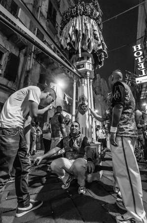 Traditional religious procession which takes place every August 14th in the city of Sassari (Sardinia), during which 10 wooden columns with the weight of 400Kg each are carried on shoulder through the city.のeditorial素材