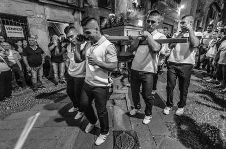 Traditional religious procession which takes place every August 14th in the city of Sassari (Sardinia), during which 10 wooden columns with the weight of 400Kg each are carried on shoulder through the city.のeditorial素材