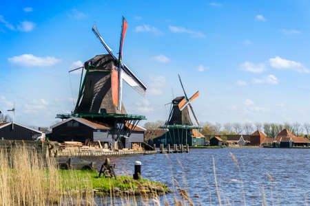 View of two windmills in Zaanse Schans near Amsterdamの写真素材