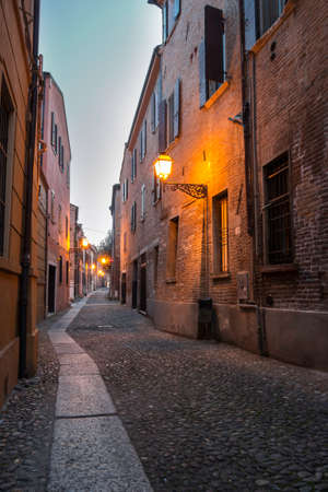 Medieval street in the downtown city of Ferraraの写真素材