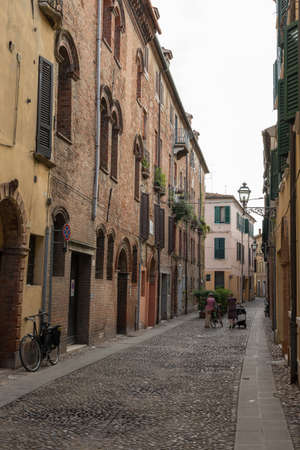 Ancient medieval street in the downtown of Ferrara cityの写真素材