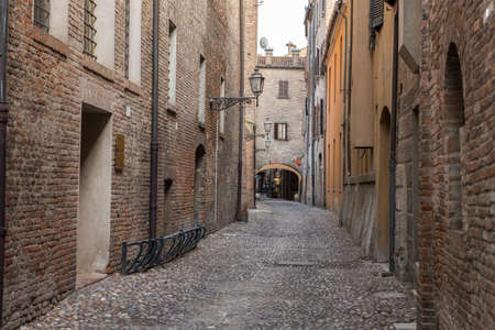 Ancient medieval street in the downtown of Ferrara cityの写真素材
