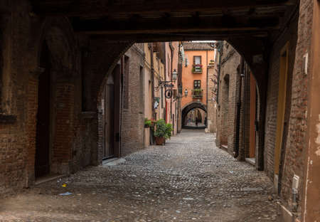 Ancient medieval street in the downtown of Ferrara cityのeditorial素材