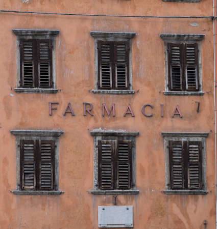 Facade of an old farmacy building in Trentoのeditorial素材