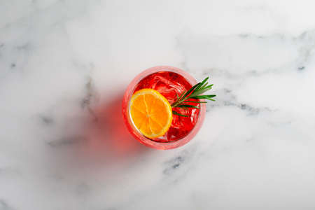spritz negroni cocktail with orange and rosemary