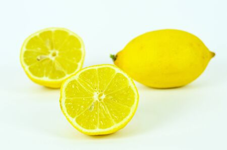 Three lemons isolated on white backgroundの写真素材