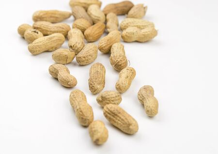 Peanuts isolated on white backgroundの写真素材